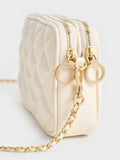 CHARLES & KEITH Mini Apfra Quilted Crossbody Bag Cream