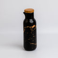 1 NOM black oil bottle