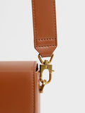 CHARLES & KEITH Elongated Crossbody Bag Cognac