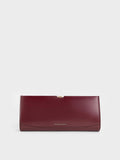 CHARLES & KEITH Wisteria Metallic-Accent Clutch_Burgundy