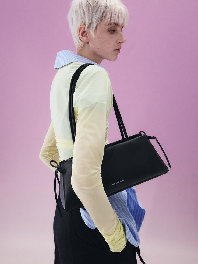 CHARLES & KEITH Women Hazel Bow Elongated Trapeze Shoulder Bag_Noir