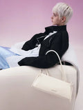 CHARLES & KEITH Women Hazel Bow Elongated Trapeze Shoulder Bag_Soft Pink