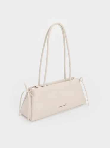 CHARLES & KEITH Women Hazel Bow Elongated Trapeze Shoulder Bag_Soft Pink