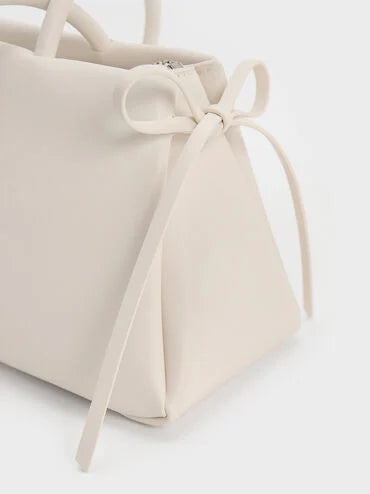 CHARLES & KEITH Women Hazel Bow Elongated Trapeze Shoulder Bag_Soft Pink