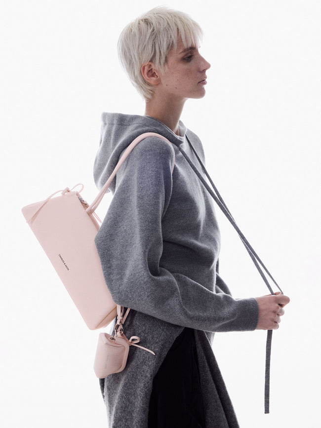 CHARLES & KEITH Women Hazel Bow Elongated Trapeze Shoulder Bag_Soft Pink