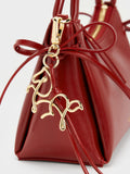 CHARLES & KEITH Women Hazel Bow Horse-Motif Top Handle Bag_Tomato Red